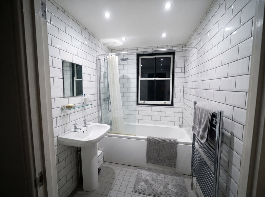 Bathroom with the ceiling spotlights on at full brightness